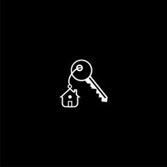  Key ring with house key and real estate or website home symbol  isolated on black background