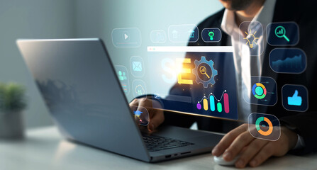 Business person who using a computer for analysis SEO. Attract organic traffic,boost visibility and...
