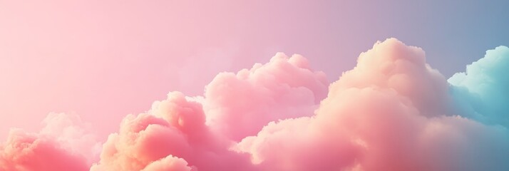 Fototapeta premium A beautiful and ethereal landscape of pastel pink and blue clouds against a soft, dreamy sky, symbolizing peace, tranquility, hope, and the beauty of nature.