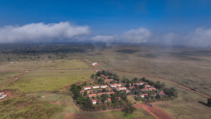 Aerial view of farmlands and rural settlement in Angola during clear weather