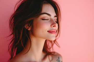 Naklejka premium A close up of a woman's face with tattoos and her eyes closed