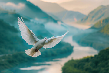 White dove flying over a serene mountain lake