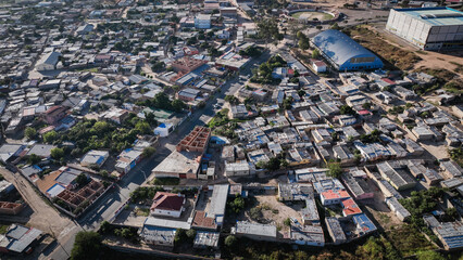 Obraz premium Aerial view of Lubango City showcasing residential areas and urban layout in Angola