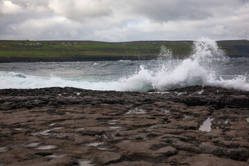 waves crashing on the rocks