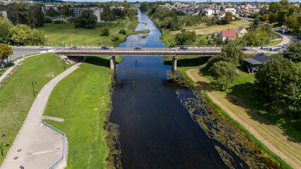 Kedainiai Bridge over the Nevezis River – partially collapsed with one beam down, one lane in...