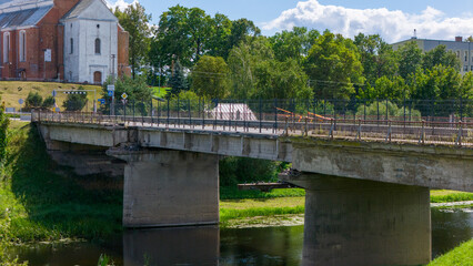 Fototapeta premium Kedainiai Bridge over the Nevezis River – partially collapsed with one beam down, one lane in use, major reconstruction planned Aug 13 2014