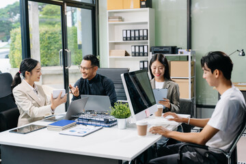 Business team discuss at meeting room. working together with laptop ,tablet and smart phone on desk Financial