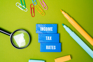 Income tax rates concept - percentages of an individual's or entity's income that must be paid to...
