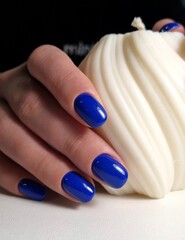 The beauty of the natural nails. Perfect clean manicure. New trendy nail arts on young women hand