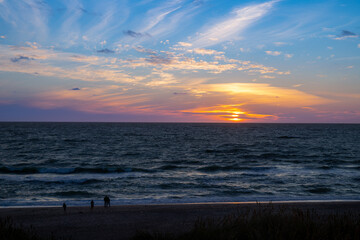 Fototapeta premium Sunset on the beach of Denmark to the North Sea between dunes