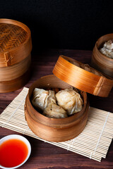 Dimsum. Chinese meal made from chicken, fish, or shrimp meat covered with dimsum skin. Perfect for recipe, article, catalogue, or any cooking contents.