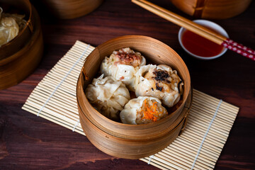 Dimsum. Chinese meal made from chicken, fish, or shrimp meat covered with dimsum skin. Perfect for recipe, article, catalogue, or any cooking contents.