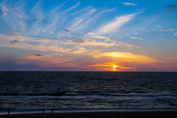 Fototapeta premium Sunset on the beach of Denmark to the North Sea between dunes