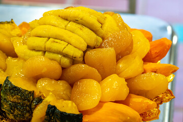 ancient Thai Dessert, thai sweet dessert set,egg yoke fudge balls cooked in syrup, Pinched gold egg yolks, appetizer