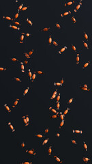 Halloween candies on a black background 3d vertical