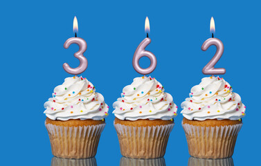 Birthday Cupcakes With Candles Lit Forming The Number 362