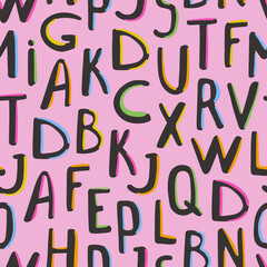 Seamless pattern with hand drawn black color letters with colorful elements