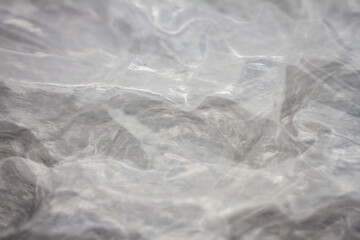 Extreme macro of plastic bubble wrap texture. Selective soft focus, shallow depth of field. Abstract dreamy background
