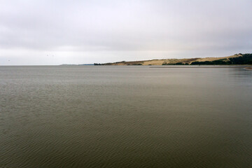 Landscape at the Curonian Lagoon on a gloomy day