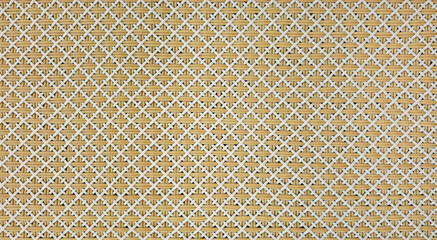 Rattan weaving texture, detail handcraft bamboo synthetic straw background. Geometric beige and...
