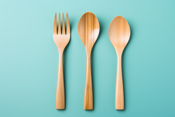 generated illustration of Set of cutlery of wooden spoon, fork on blue background