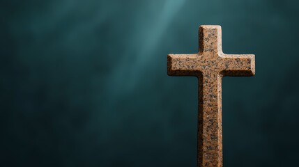 A rustic wooden cross stands against a soft blue background, symbolizing faith and spirituality in a serene atmosphere.