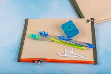 Dental cleaning kit in beach bag. set for thorough cleaning of the oral cavity. Equipment for cleaning braces and plaque from teeth. Necessary tools for brushing teeth.