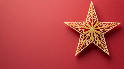 Vibrant Christmas star with frosted details in papercut style on a plain red background perfect for festive banners with copy space