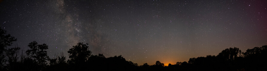 Fototapeta premium The Milky Way, the setting of the moon and the starry night