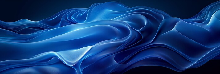 Obraz premium An abstract image showcasing graceful blue waves and folds against a dark background, creating a sense of fluidity and motion.