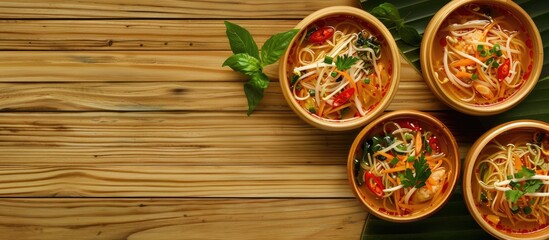 Asian food recipes featuring ingredients on a wooden table representing a healthy cooking concept. with copy space image. Place for adding text or design