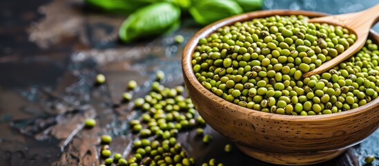 Mung beans for preparation using a wooden spoon. with copy space image. Place for adding text or design