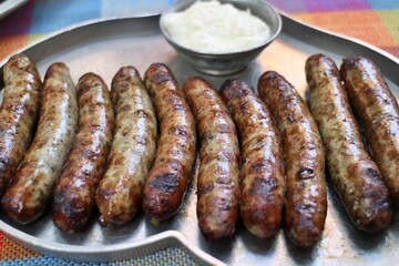 German cuisine: bratwurst (grilled pork sausages) with horseradish in Nuremberg, Germany