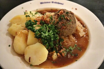 German cuisine: leberknödelsuppe (liver dumpling soup) in Munich, Germany