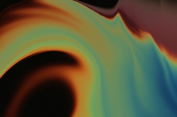 abstract noisy colorful background, rainbow gradient smears on black, dark grainy rainbow paint swirls, orange green red yellow blue colors banner poster cover abstract design, black space
