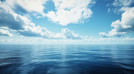 A vast, tranquil ocean stretches out beneath a clear blue sky dotted with fluffy white clouds. The sun glints off the water, creating a peaceful and serene atmosphere.