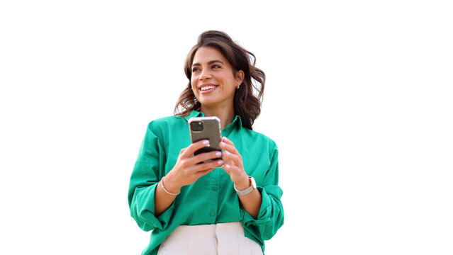 Young woman taking a city break to look at her smartphone