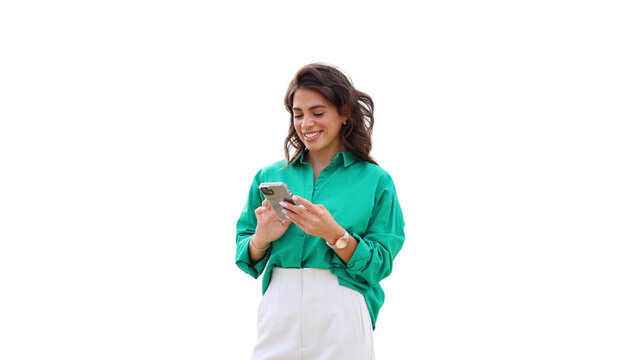 Young woman taking a city break to look at her smartphone
