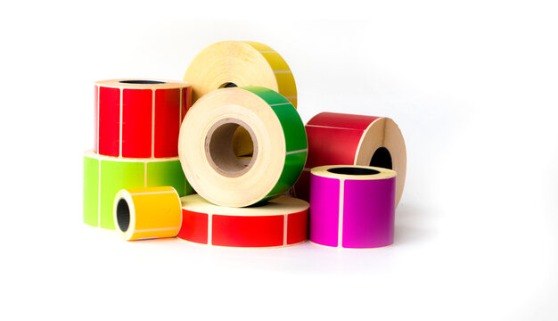 Red, yellow green label rolls on a white background. Labels for printing on a thermal transfer and thermal printer.