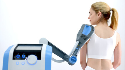 Close-up of a high-inductive magnetotherapy device on a light background. Showcasing advanced...