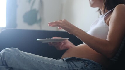 Pregnant woman at 14 weeks eating healthy foods, fruits, and vegetables. Promoting self-care and awareness during pregnancy. Focus on diabetes and women's reproductive health