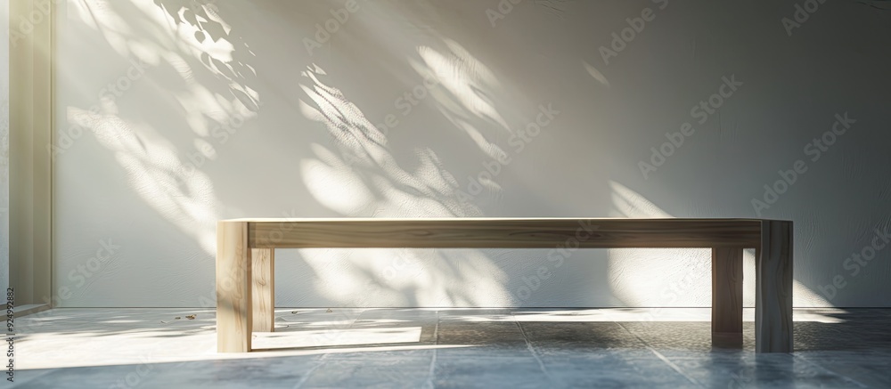 Poster empty modern table in a room illuminated by light from a window providing ample copy space image