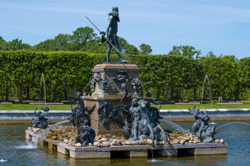 Neptune Fountain close-up on a sunny June day. Peterhof