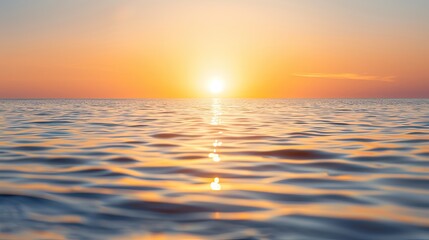 Obraz premium Serene Sunset Over Ocean With Distant Lighthouse