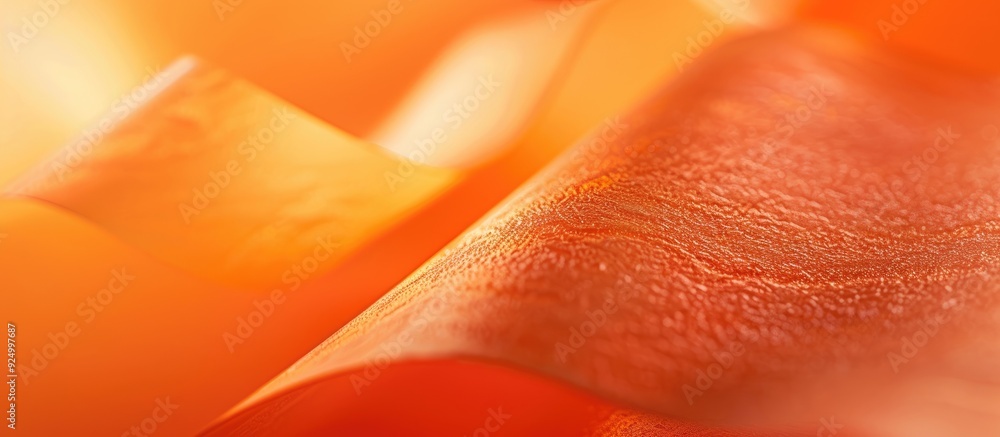 Aufkleber close up image of a textured orange paper with a blurred background suitable for copy space