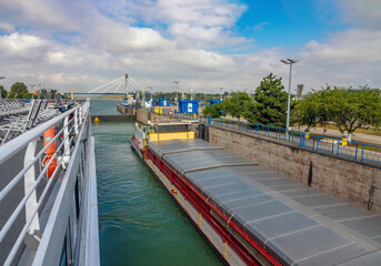 Navigating through a lock of the  Danube–Black Sea Canal between Cernavodă on the Danube river and Constanța on the Black Sea, Romania