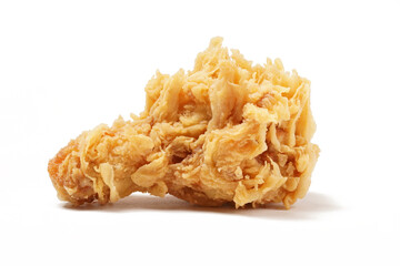 Golden fried chicken with a crispy, flour-coated skin, photographed against a white background.