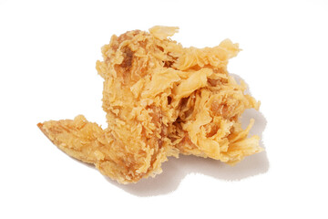 Golden fried chicken with a crispy, flour-coated skin, photographed against a white background.