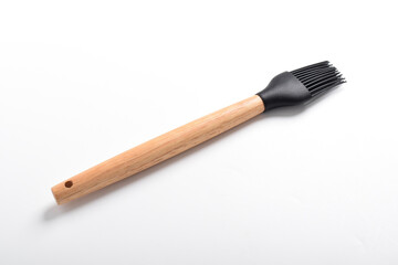 Kitchen silicone brush isolated on white background. Cooking brush for spreading oil on food. Kitchen utensils and utensils.