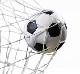 Naklejka premium Soccer ball in goal net isolate on white background 